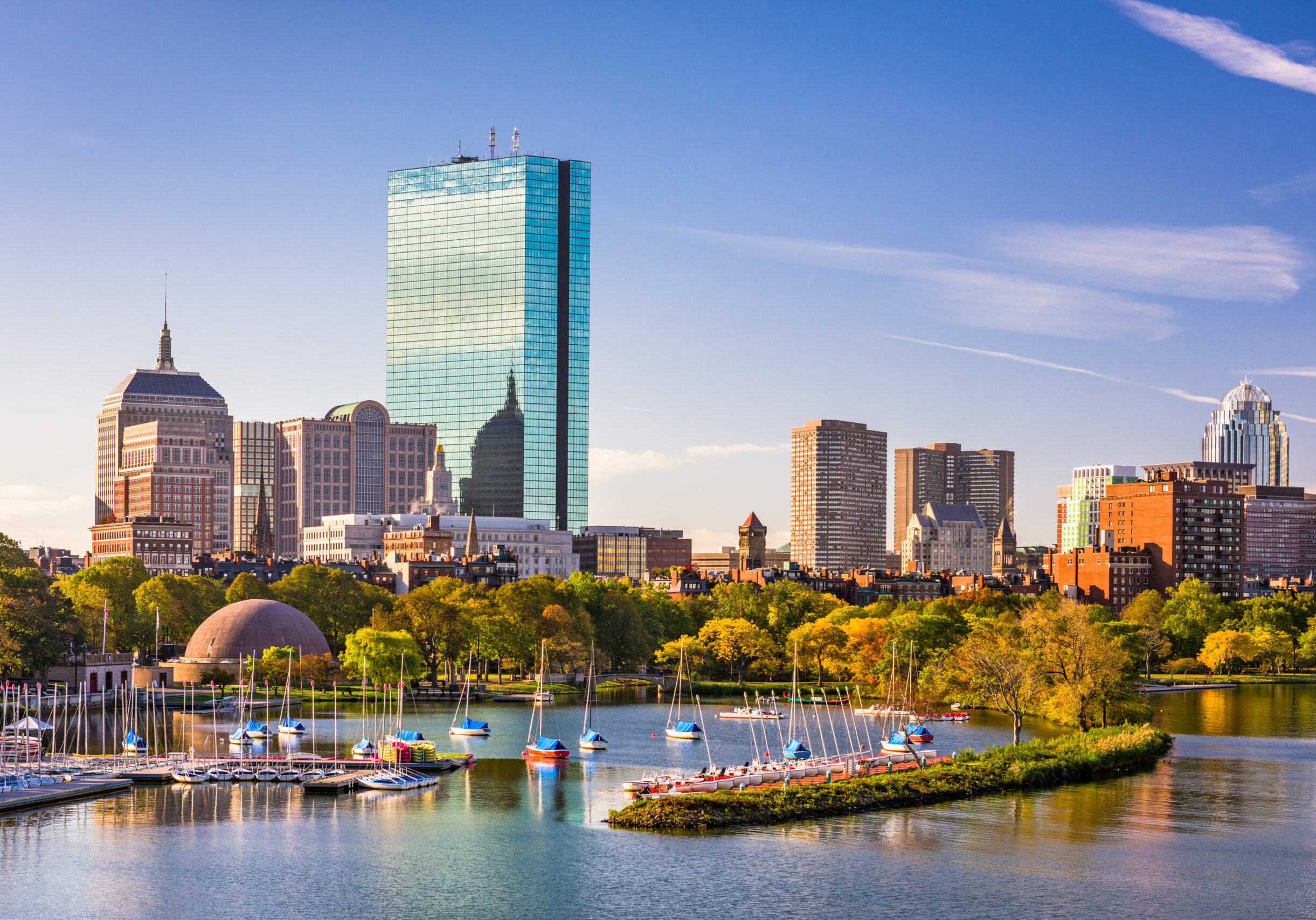 Boston, Massachusetts, USA city skyline on the river.